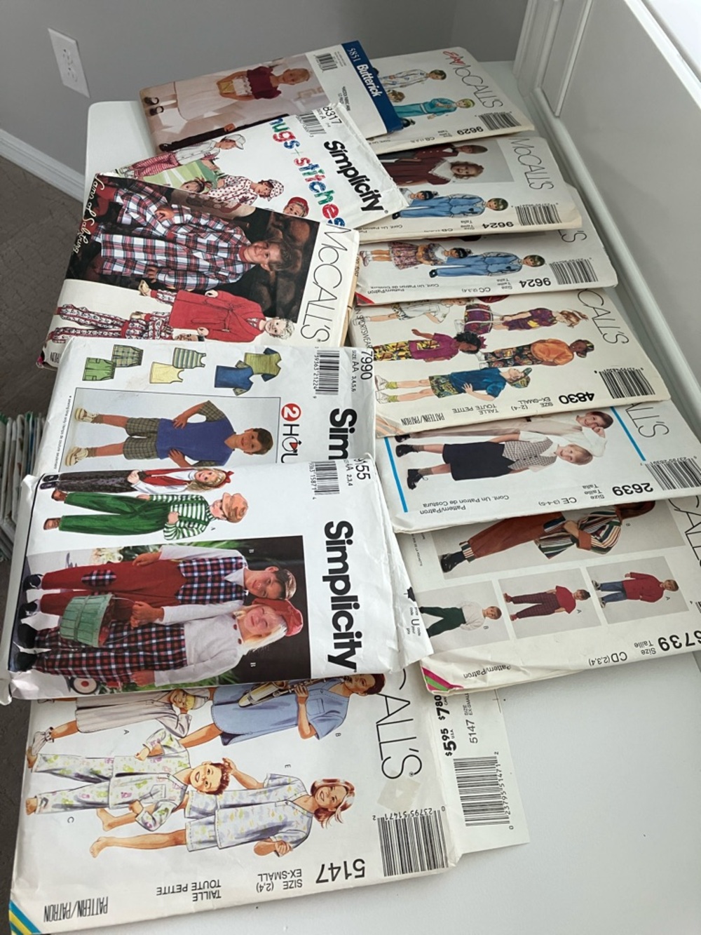 12 children’s sewing patterns sizes one through four and six